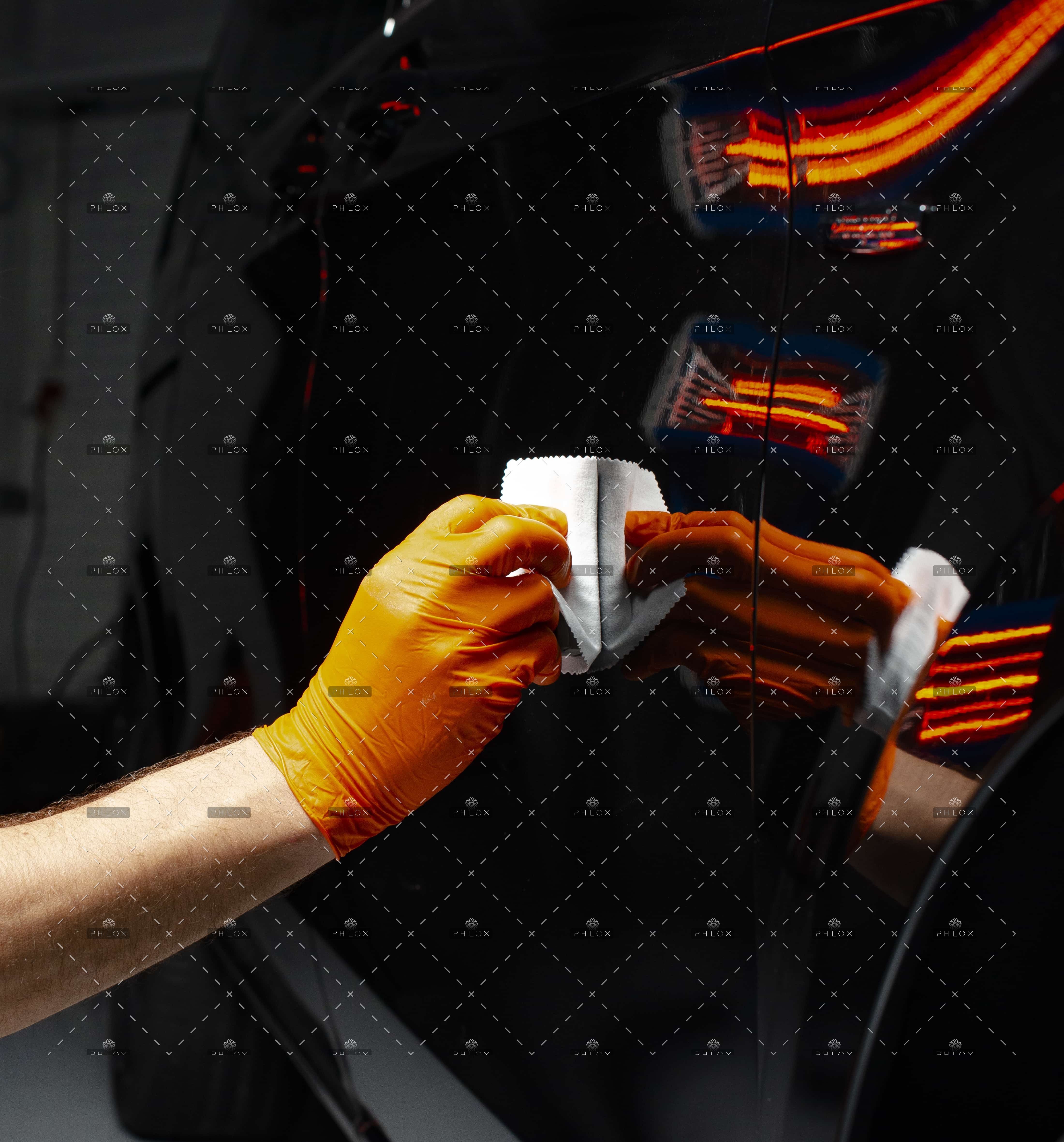 demo-attachment-433-op_car-polish-wax-worker-hands-polishing-car-7XCEH6F